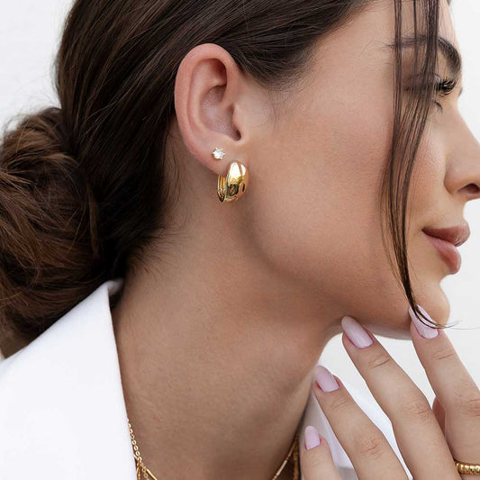 Guía definitiva: Cómo elegir aretes según tu tipo de rostro