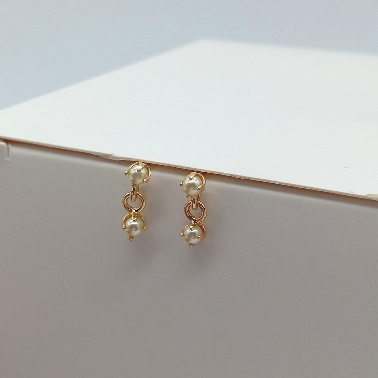 Arete colgante perlado
