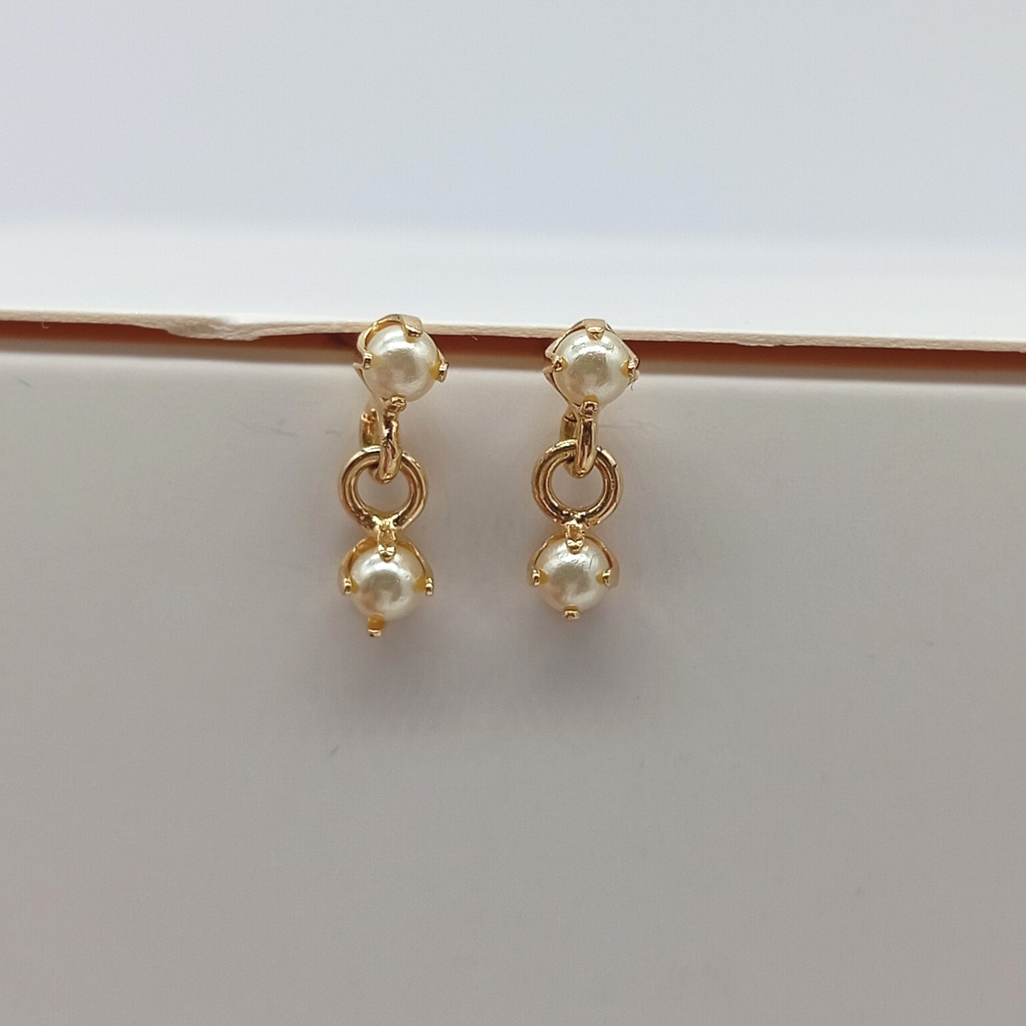 Arete colgante perlado